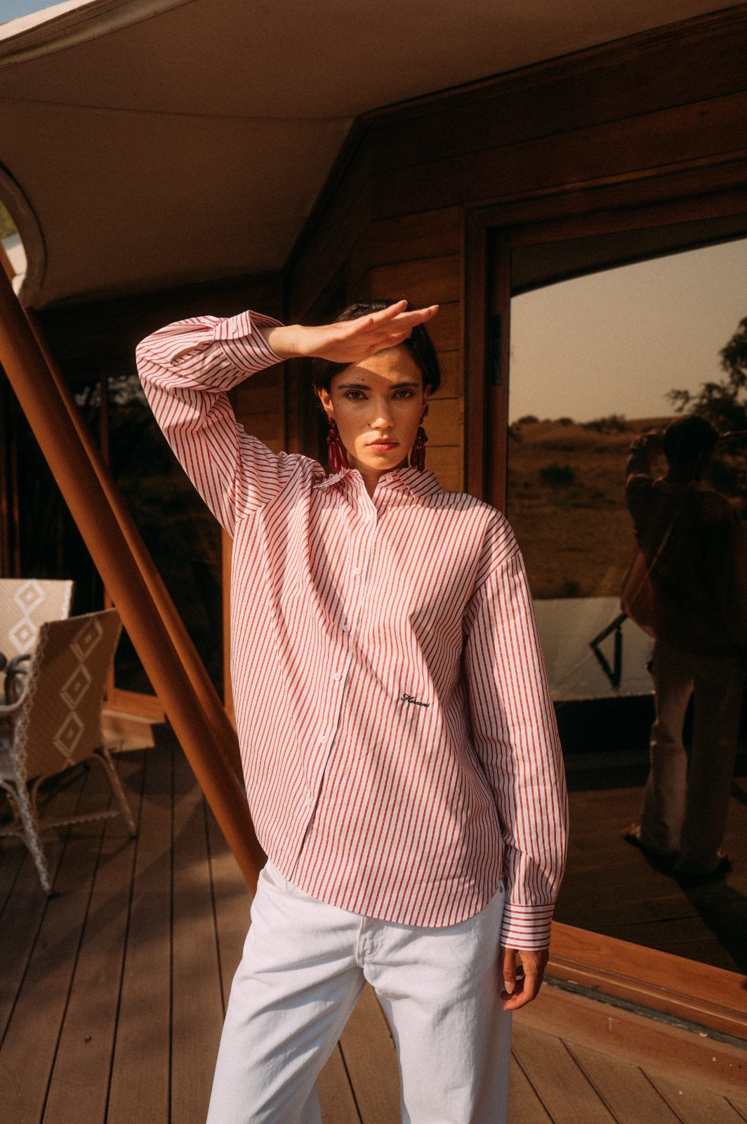 Pink stripe shirt on the deck