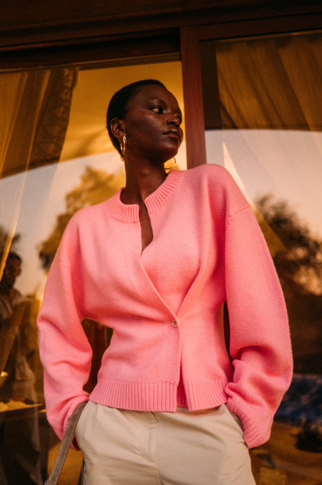Pink cardigan on the deck