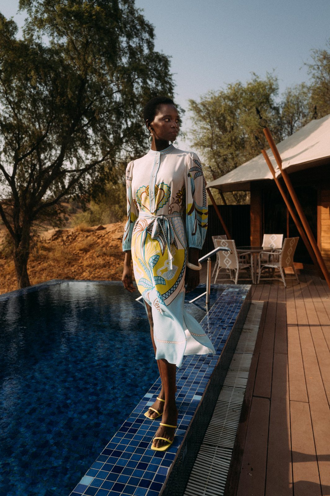Printed dress by the pool